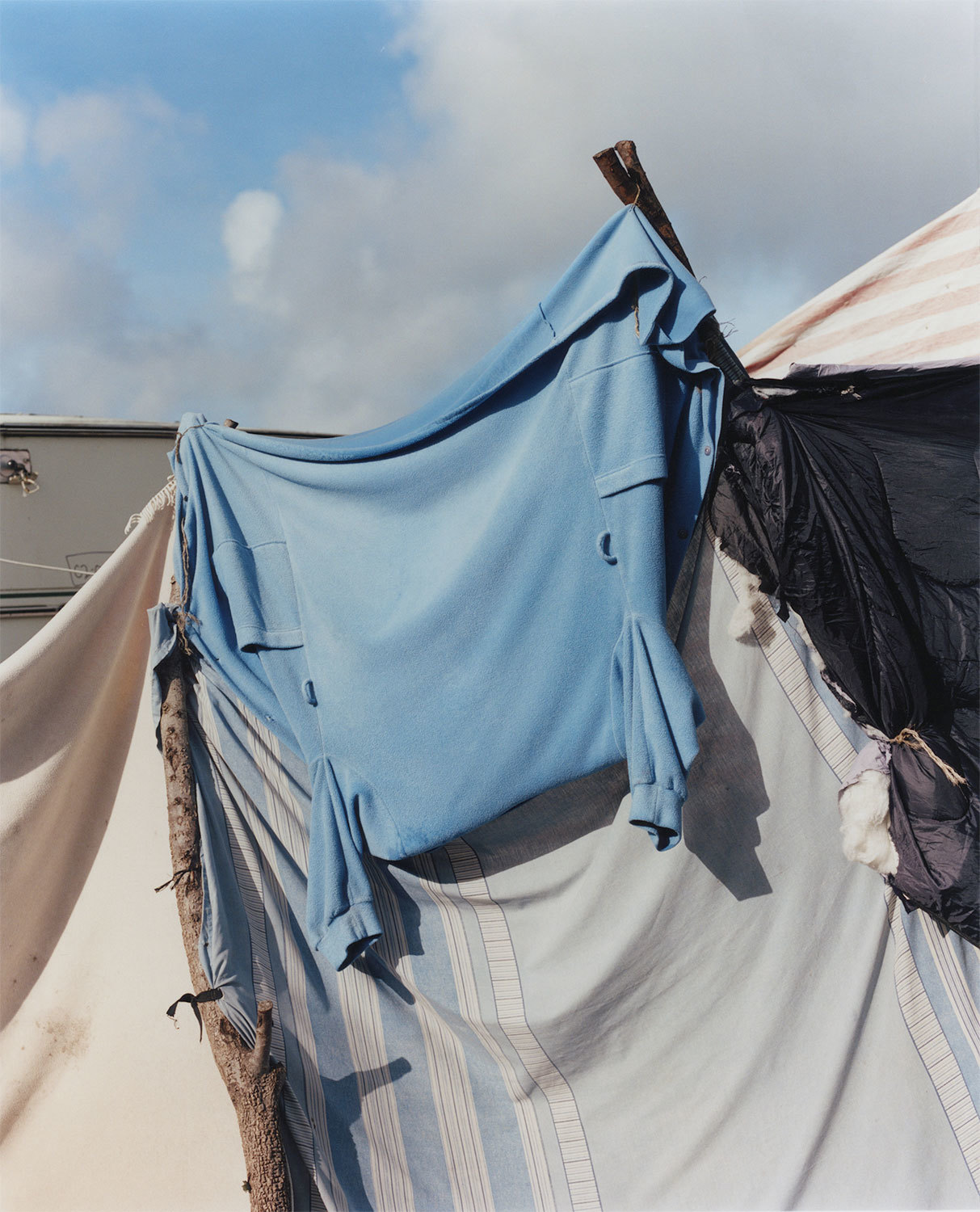 harley weir on shooting the homes and houses of the calais jungle - 'Homes'  is a new photobook by Harley Weir that documents the Calais Jungle with a  raw beauty and emotional