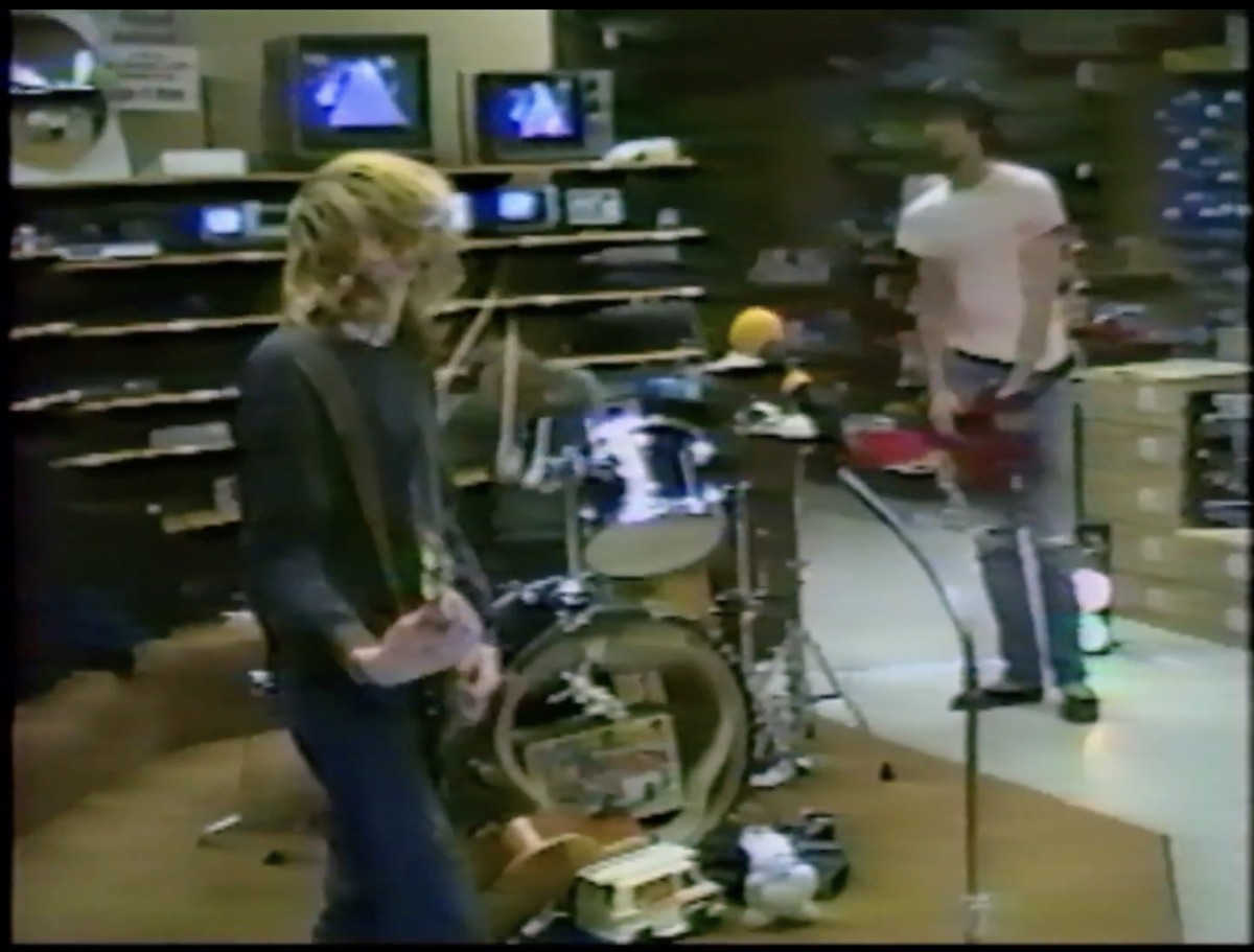 Watch Unearthed Footage Of Nirvana Performing At A Radioshack In 1988 I D